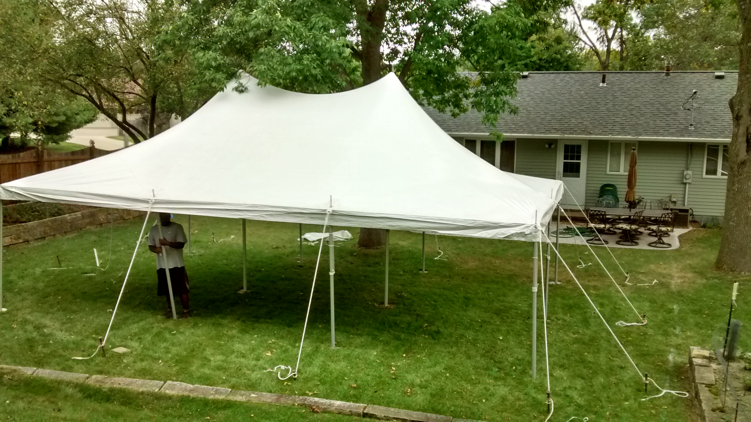 Backyard party with a 20' x 30' rope and pole tent in Iowa ...