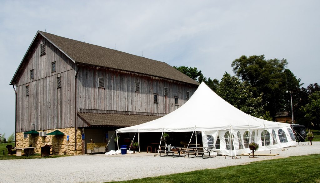 40' x 40' Rope and Pole tent next to barn at Sutliff Cider Company