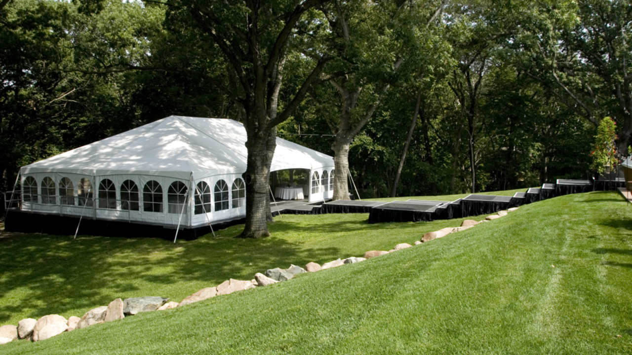 Level Tent On Stage For Backyard Wedding With Stepped Walkway