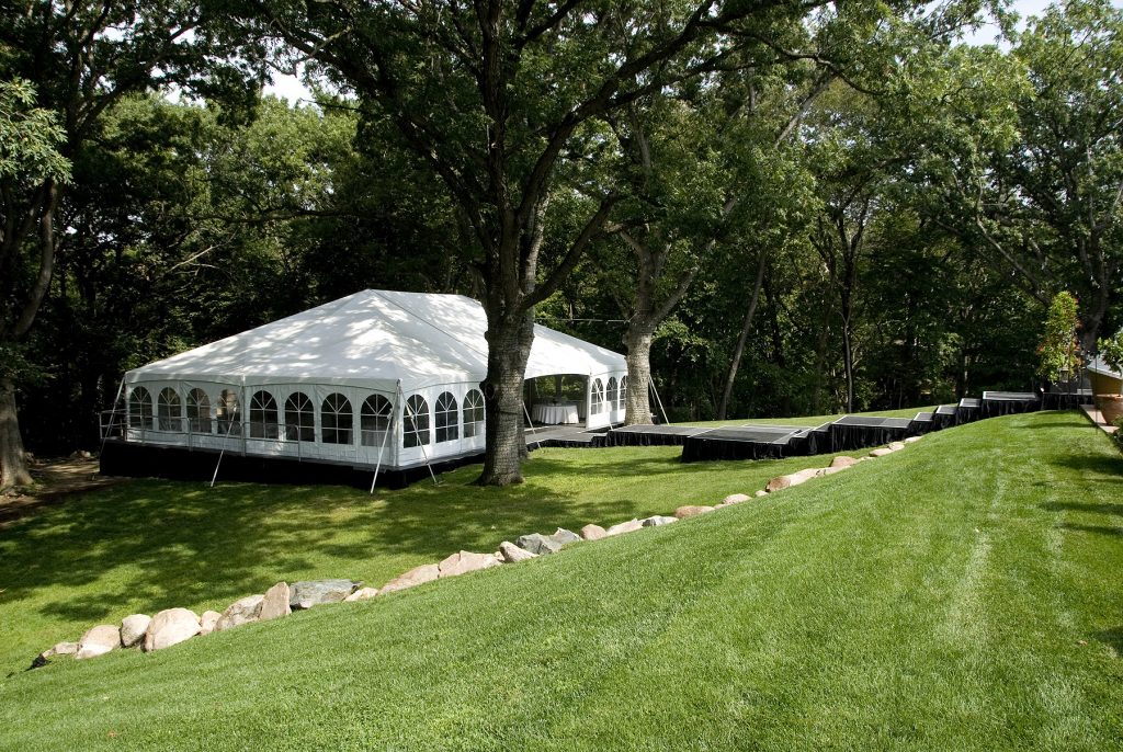 Backyard wedding and reception under tent