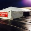 20' x 60' frame tent used for a clearance event in the parking lot.
