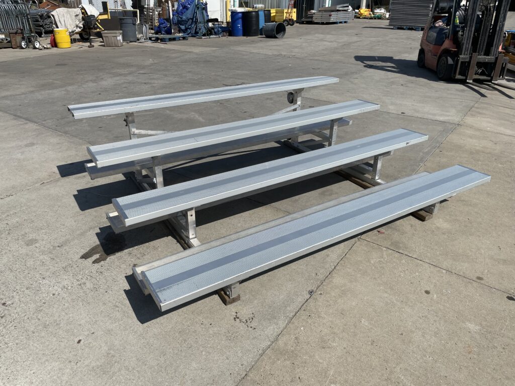 4-row low rise bleacher - Seats 24 people and is 9′ long (left side)