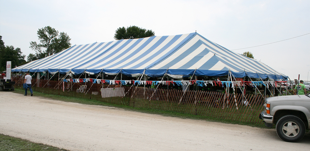 40' x 100' blue and white rope and pole tent for rent.