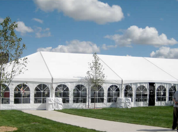 Outside view of our 40' x 100' hybrid event tent shown with french side walls installed.