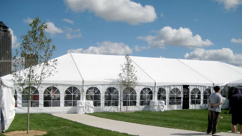 Outside view of our 40' x 100' hybrid event tent shown with french side walls installed.