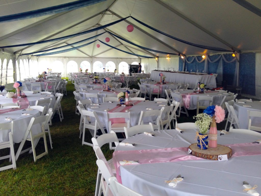 Wedding reception under our 40' x 100' hybrid tent.