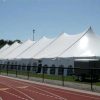 40' x 140' Rope and Pole event tent with French side walls installed.