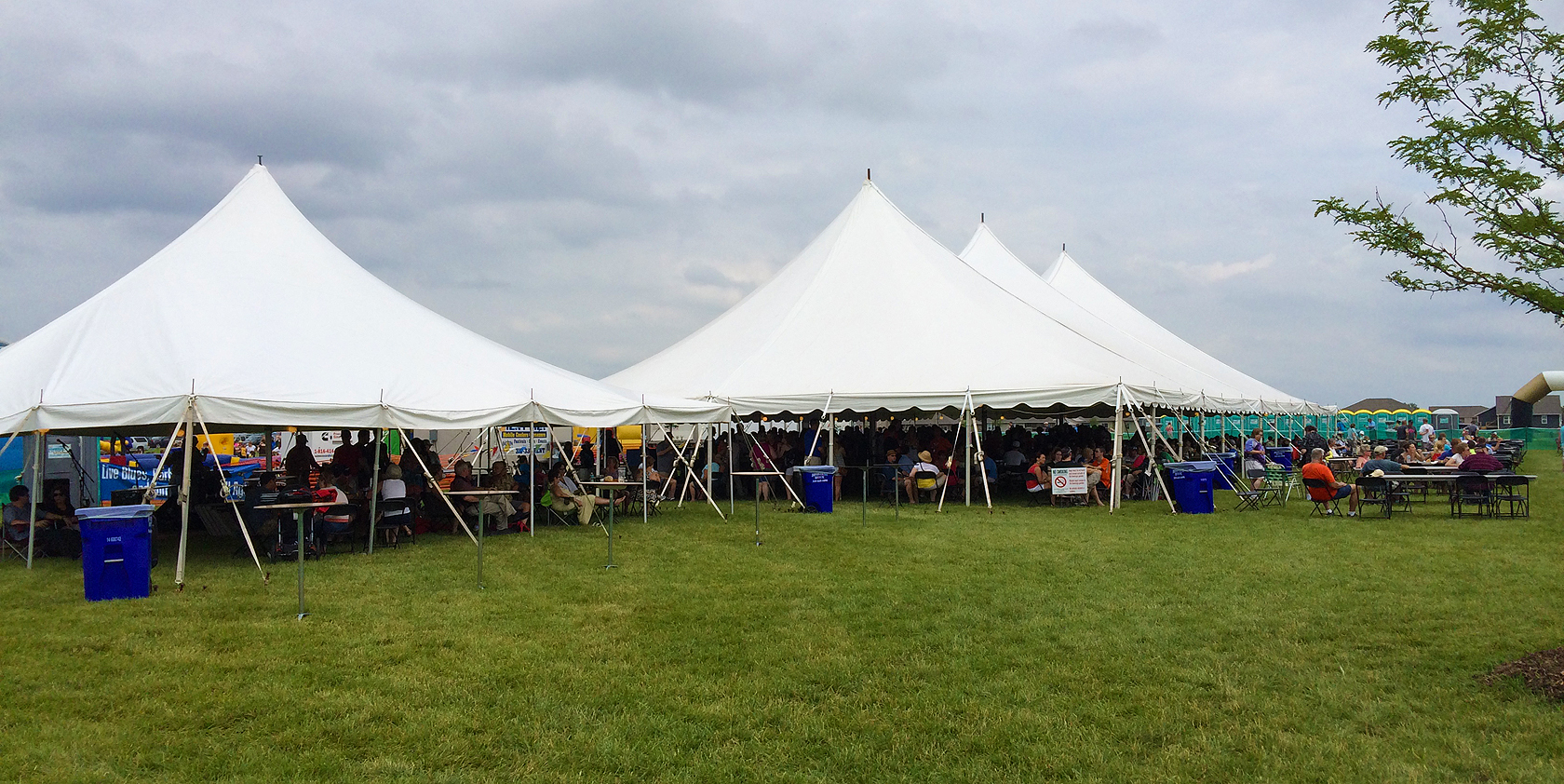 View of our 40' x 40' and 60' x 120' event tents at the North Liberty Blues and Barbecue festival in Iowa on July 12th 2014.