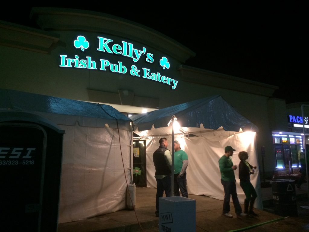 Door to Kelly's Irish Pub and Eatery with 10' x 20' entrance tent