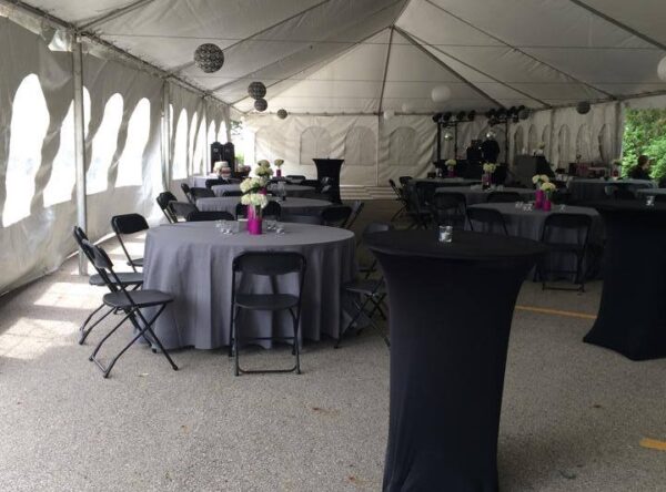 Pre-wedding reception area under Big Ten Rentals 30' x 90' frame tent