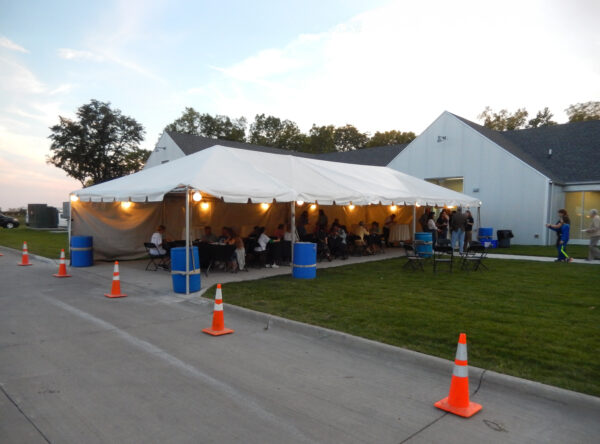 Rent 20' x 50' frame tent with tables, lights, linens and chairs