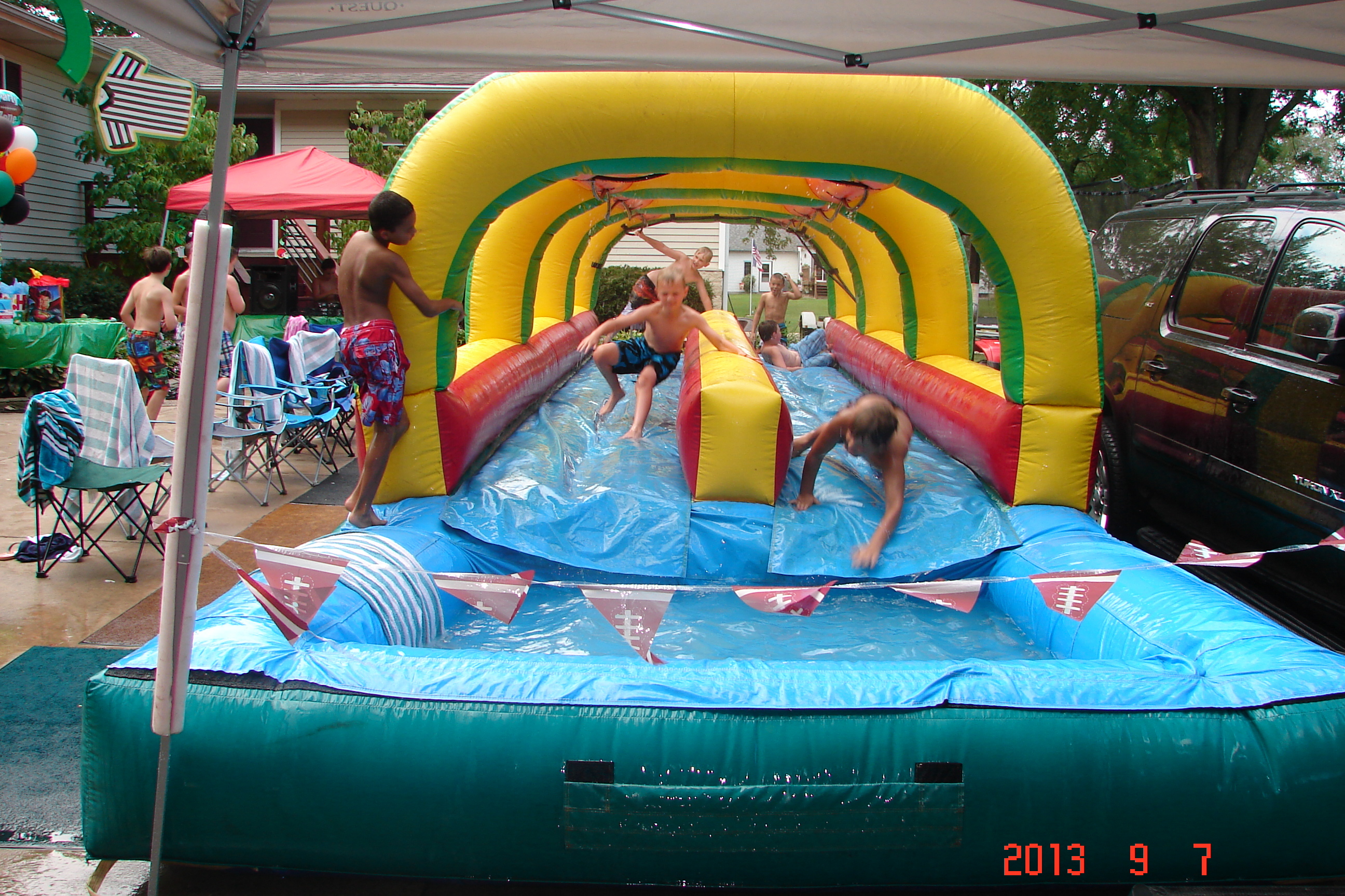 Rent dual lane Slip 'n Slide inflatable with splash pool Iowa City