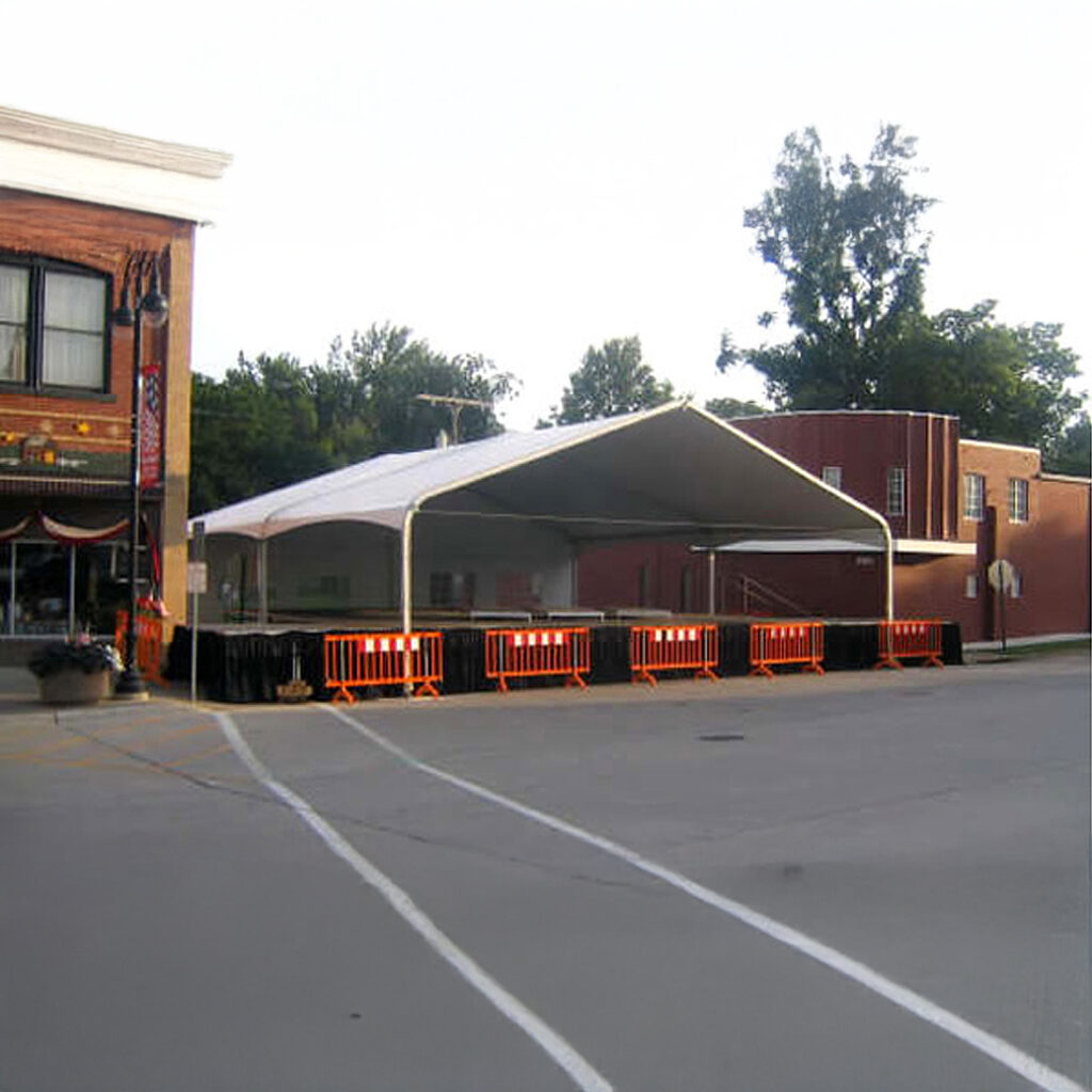 Stage under bandshell covering (tent)