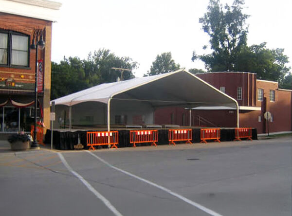 Stage under bandshell covering (tent)