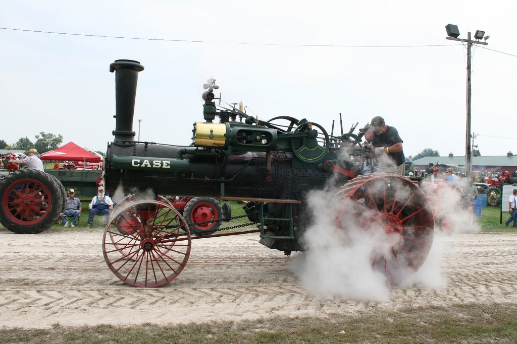 CASE tractor letting off steam at the Old Thresher's Reunion