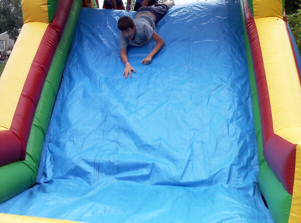 Face first slide on obstacle course