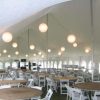 Outside of our 40' x 100' Elite "Rope and Pole" event tent with French side walls installed. Japanese lanterns, tables, chairs and staging also rented from Big Ten Rentals.