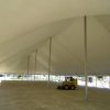 Under the 60' x 150' Rope and Pole tent made by Genesis.