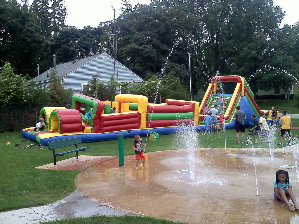 Obstacle course by water fountain Iowa City, Cedar Rapids Party and