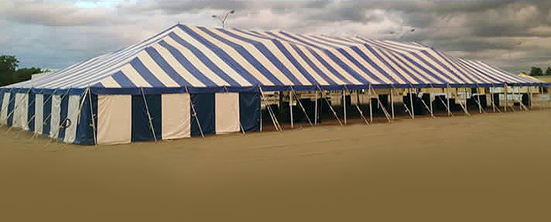 Outside of the 60' x 150' Gala rope and pole tent for rent.