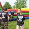 Members of the McGrath Auto boot camp size up the obstacle course.