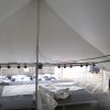 Post event teardown: View of the concert stage inside our 40' x 140' rope and pole event tent.
