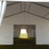 Inside the 30' x 60' (9m x 18m) Losberger clearspan tent with an added gable/subdivision.