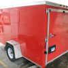 Back of our Orange/Red 6'x12' single axel enclosed utility cargo trailer for rent.