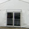 View from the outside of a glass door installed on an event tent.