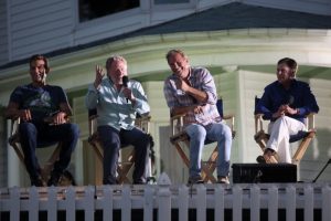 Bob Costas (right) hosts a question and answer segment with "Field of Dreams" cast members Dwier Brown (from left) Timothy Busfield, and Kevin Costner during the film's 25th Anniversary at the Field of Dreams movie site near Dyersville, Iowa, on Friday, June 13,2014.