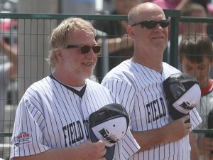 Timothy Busfield and Kevin Costner at Field of Dreams with Big Ten Rentals temporary security fencing in the back.