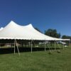 Outside at the end of 60′ x 90′ “Twin-Pole” Legend rope and pole tent