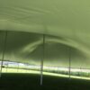 Under 60′ x 90′ “Twin-Pole” Legend rope and pole tent side