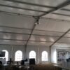 Inside of 50' x 50' Losberger clearspan tent at Farm Progress Show with French windows