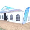 Outside of 50' x 50' Losberger clearspan tent at Farm Progress Show