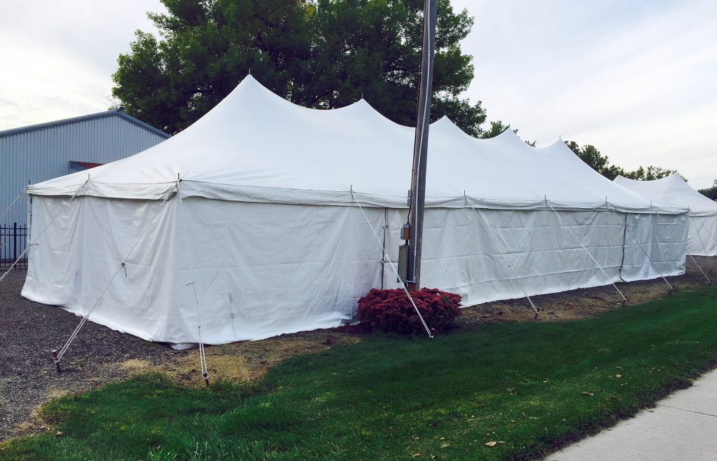 20' x 60' rope and pole tent set up at the Kalona Fall Festival.