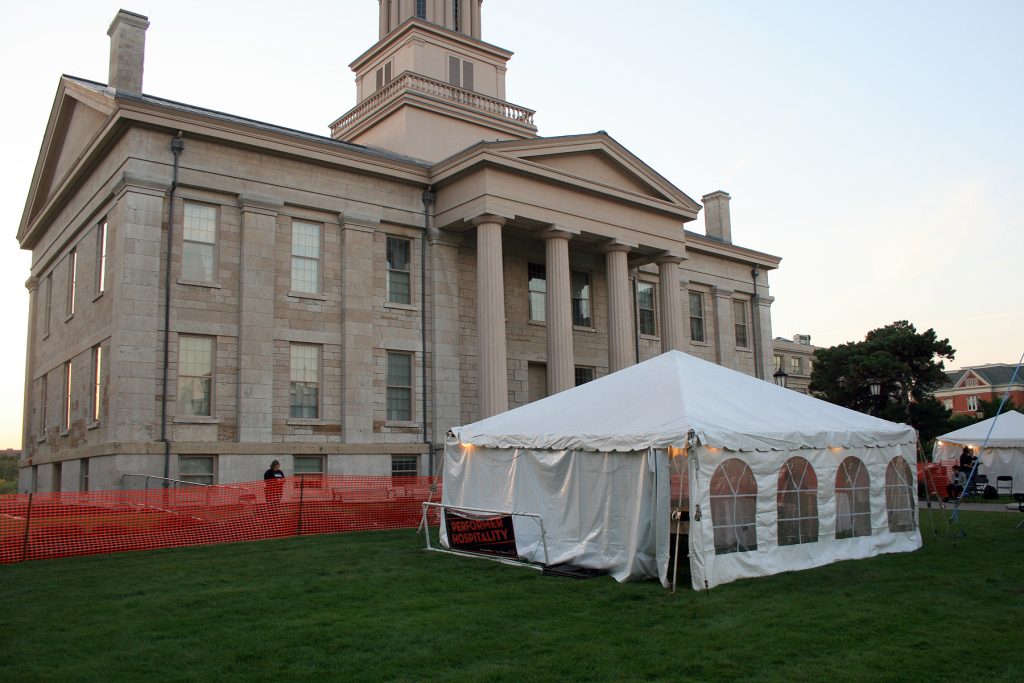 Frame tent in front of old Iowa Capitol Building