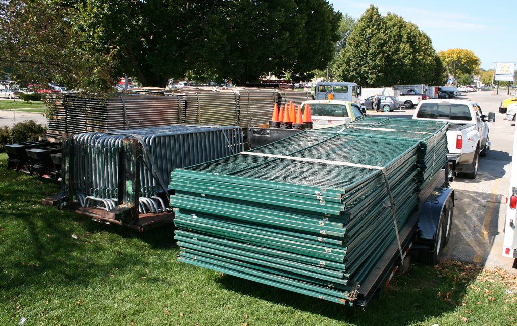 Items (Far left stacks of tables, bike barricade and temporary event security fencing) loaded for deliver for 2014 Northside Oktoberfest at Big Ten Rentals on Thursday, September 25, 2014