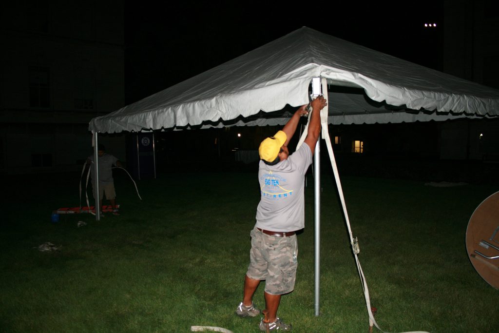 Securing a frame tent with stakes