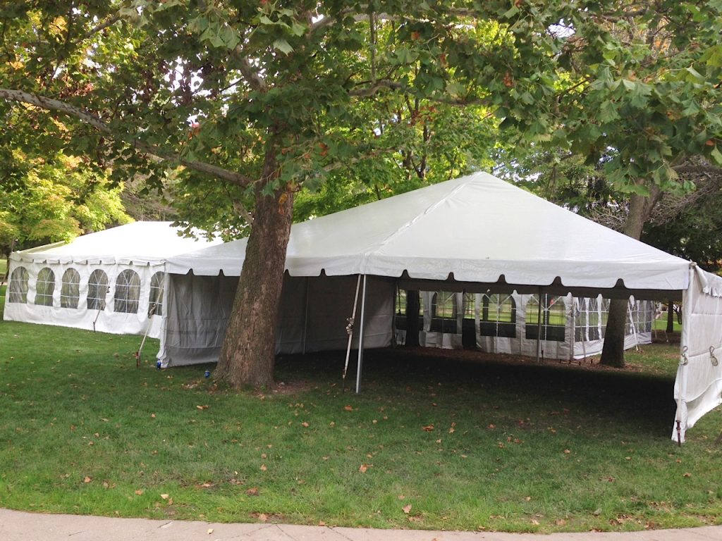 30' x 30' frame tent with 40' x 80' hybrid tent behind it.