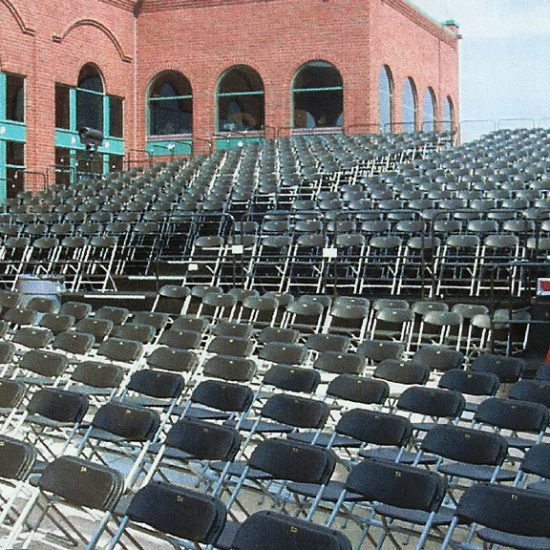 Tiered stage rental with chairs