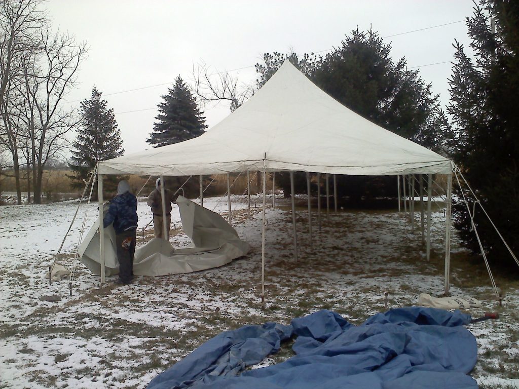 20' x 60' rope and pole tent set-up in snow