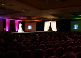 Female model on catwalk for Fashion Show at the Iowa Wedding Expo