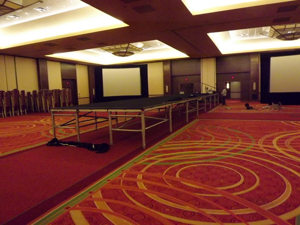 Setting up the Model Runway for Iowa Wedding Expo