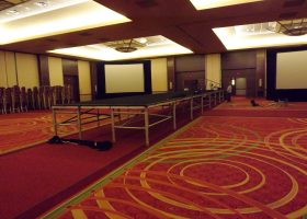 Setting up the Model Runway for Iowa Wedding Expo