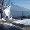 Side of the 40' x 60' hybrid tent with entry way