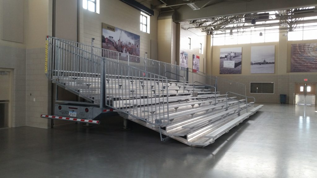 45' towable bleacher installed close to wall.