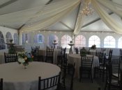 Inside 40′ x 60′ jumbo track tent at grand opening with french windows