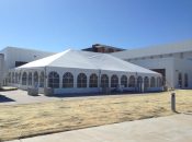 Outside view of 40′ x 60′ jumbo track tent at grand opening