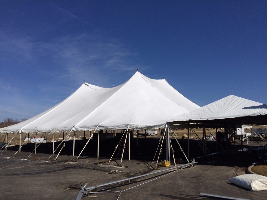 Outside view of a twin pole rope and pole event tent